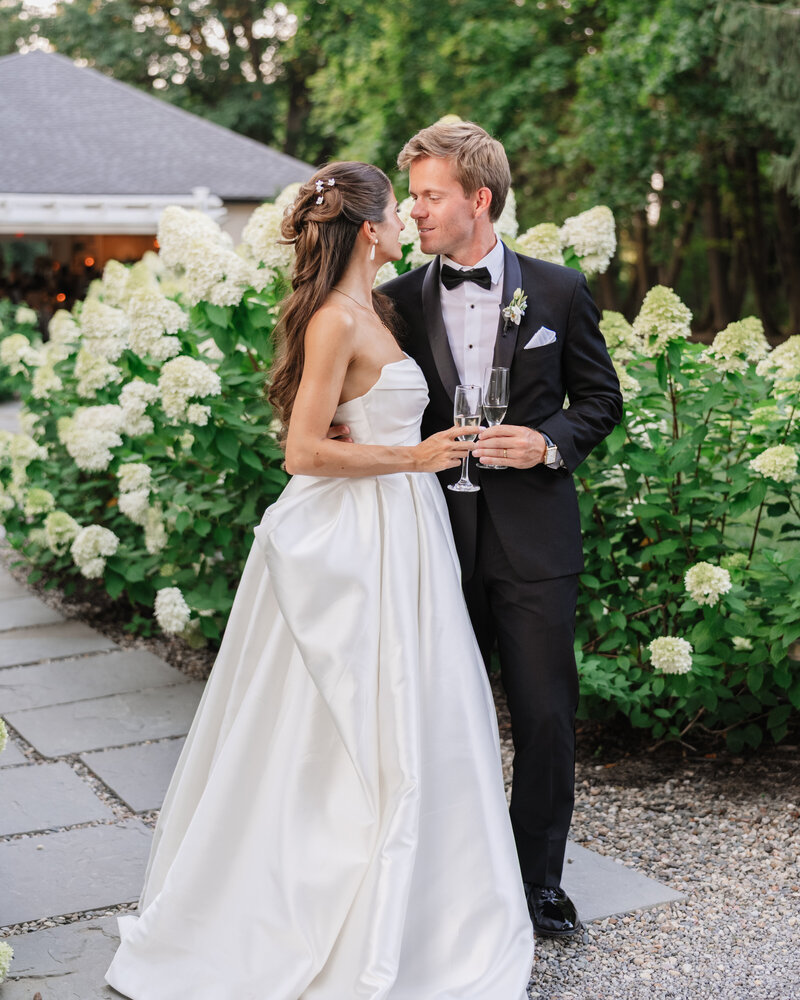 Bride and groom sharing a joyful moment at Greencrest Manor wedding reception