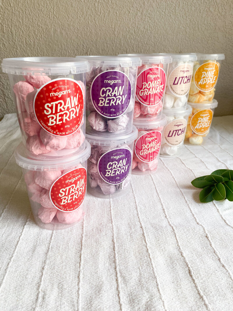 Megan's meringue tubs in fruit juice flavours, strawberry, cranberry, pomegranate, litchi, pineapple