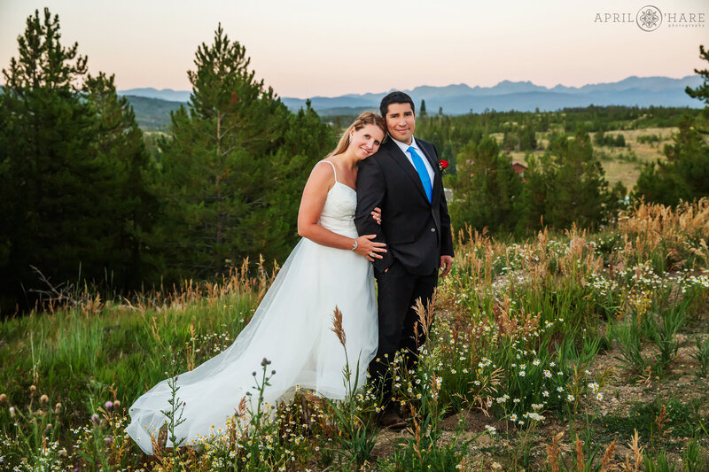 Mountain View backdrop for a wedding picture at Snow Mountain Ranch during summer