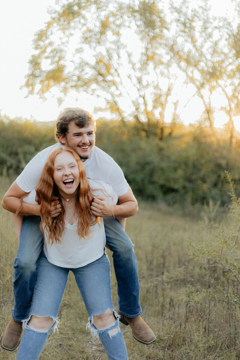 couple piggyback laughing