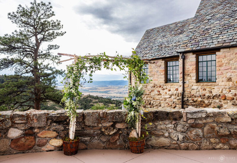 Floral Wedding Arch on the Patio at Cherokee Ranch & Castle in Colorado