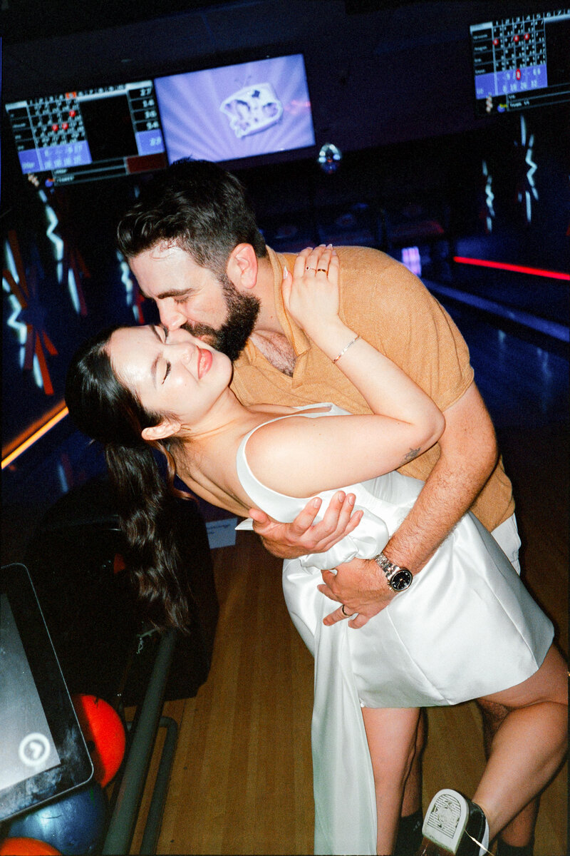 Unique wedding after-party at a bowling alley photographed on film with flash