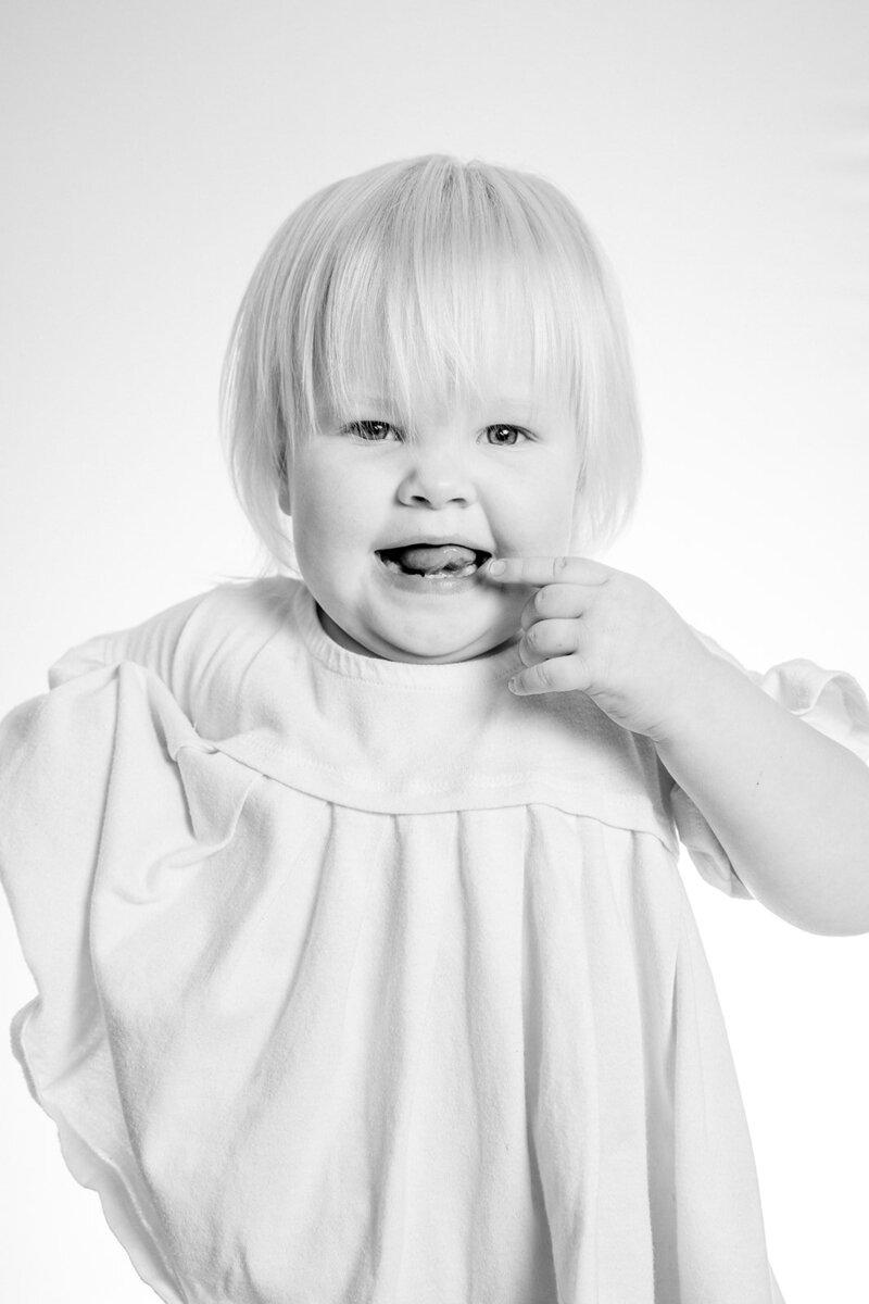 young girl in black and white portrait session at Deltona studio