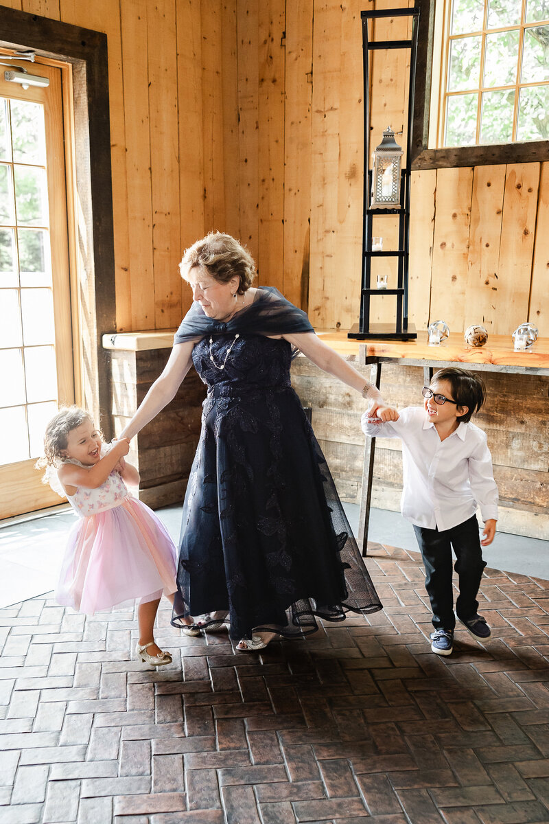 Kids dance with grandparent
