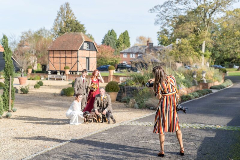 Juliet photographing wedding party