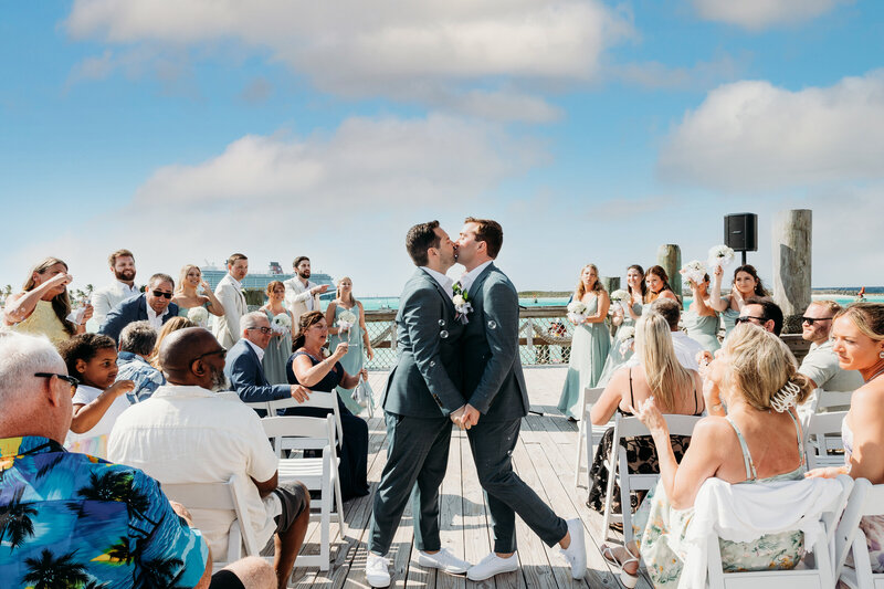 Grooms Kiss after ceremony on Castaway Cay