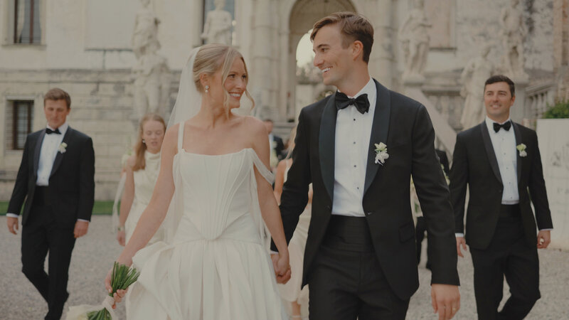 married couple holding hands
