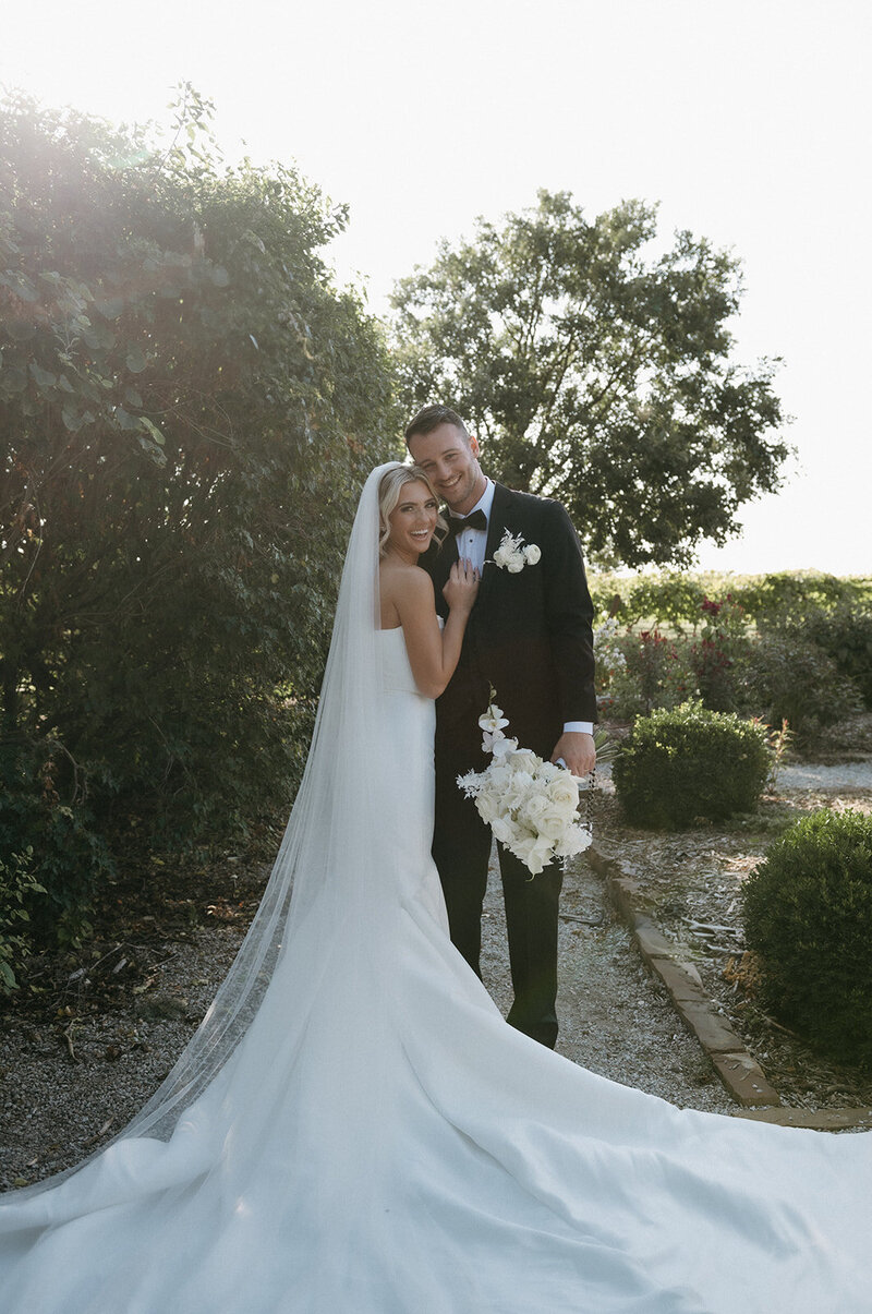 Bride and groom fun portraits session in the garden