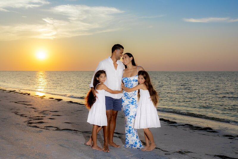 Family portrait on the beach by Sarasota photographer, Love and Style Photography