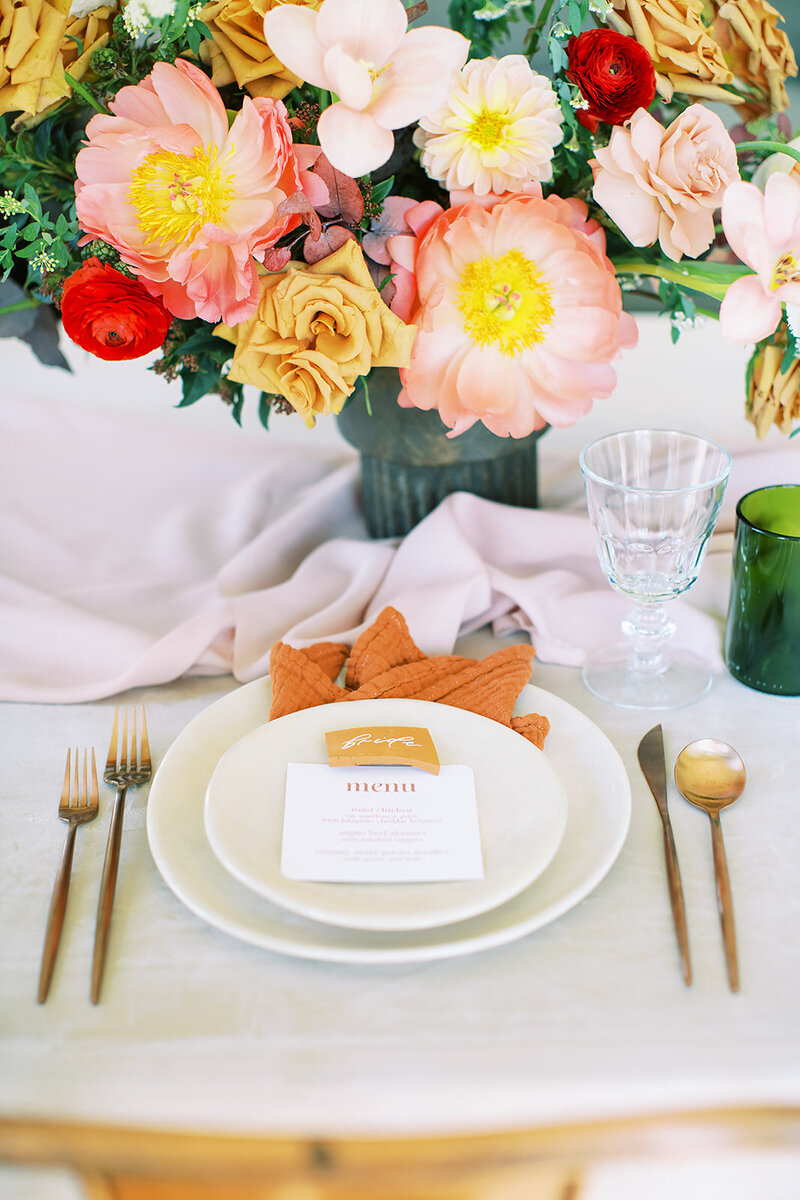 Orange, red and yellow wedding table setting