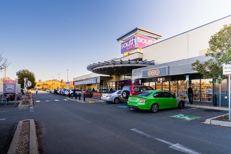 Southcity Shopping Centre retail expansion in Wagga Wagga, NSW, constructed by Serlana Constructions — showcasing the extended Coles supermarket and modern storefront design with active customer access and parking.
