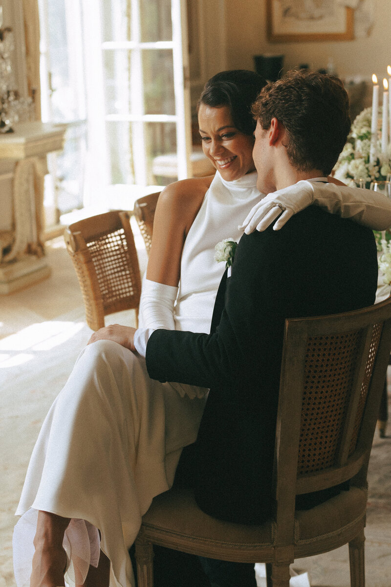 A candid photo of a bride and groom during their wedding day. Wedding in Newport Rhode Island. Luxury wedding venue.