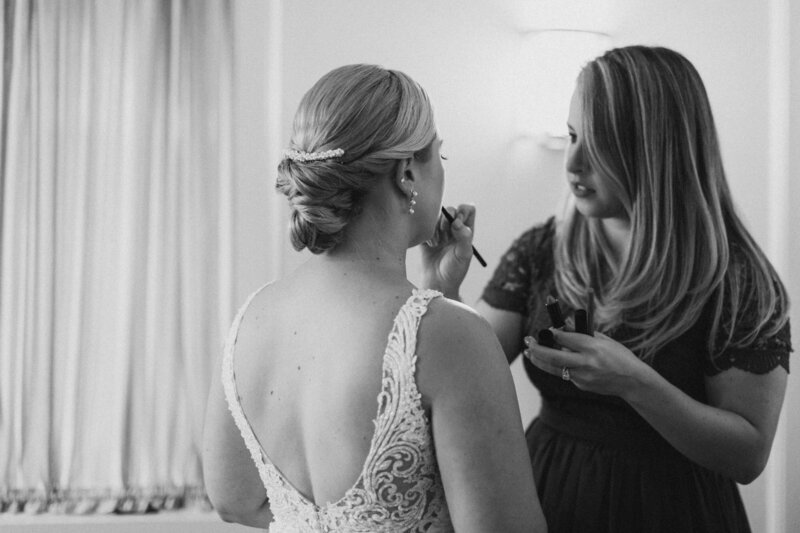 Bridal Makeup Artist Applying Lipstick