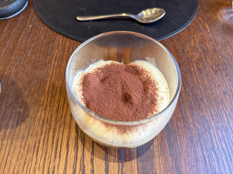 Dessert of Tiramisu made by Giorgio himself at Ristorante Giorgio in Lucca, Italy