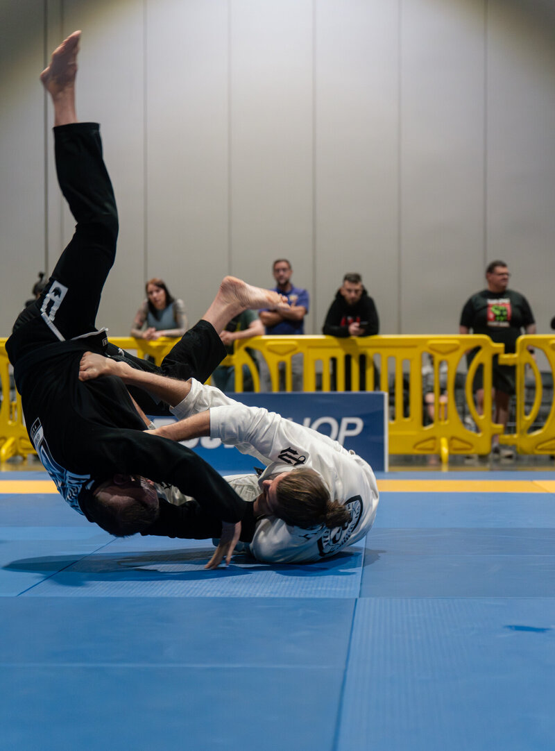 Two black belt athletes grappling in the PNW. 
