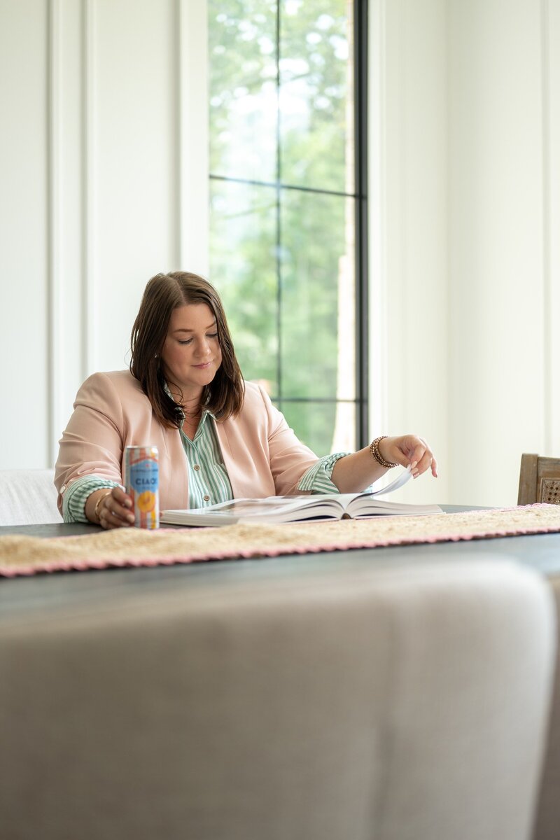 Thoughtful home staging details like pillows, florals, and ambient lighting