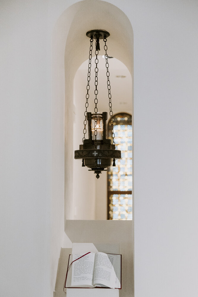 A Bible in an alcove at a Catholic church