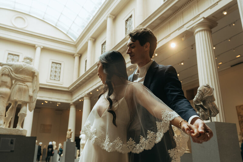 bride and groom at the Met before NY city hall elopement shot by Elsie Goodman Photography | NYC Elopement Packages
