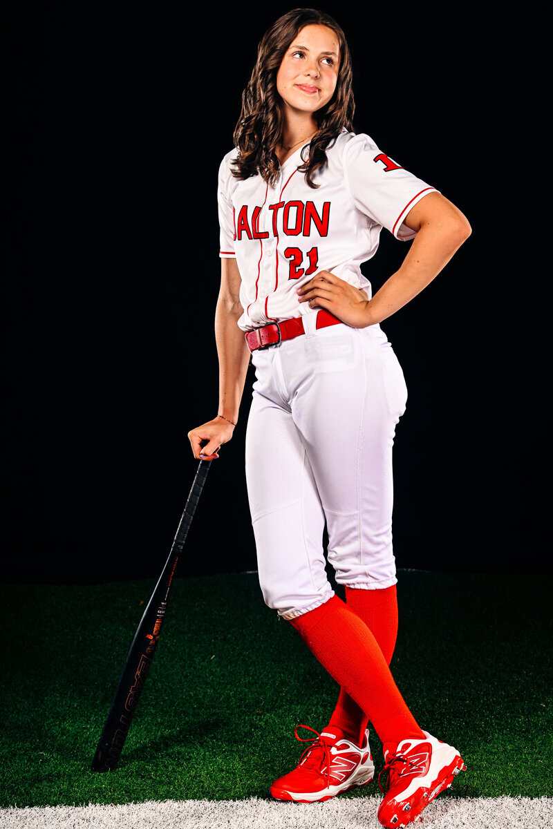 a high school softball player smilesd during her media day