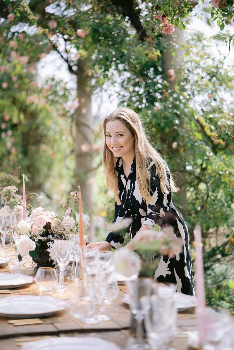 UK wedding planner Rachel Dalton styling a wedding table