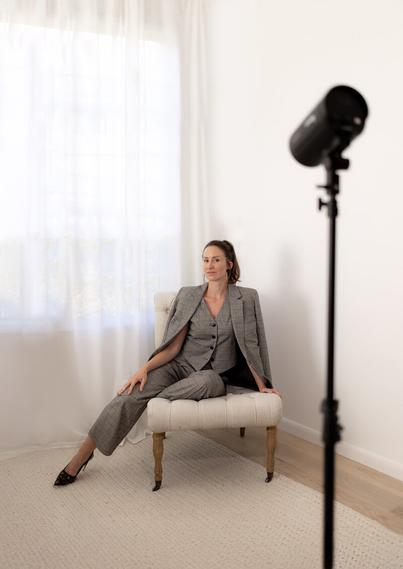 Franzi walking through Charleston marsh looking back at camera