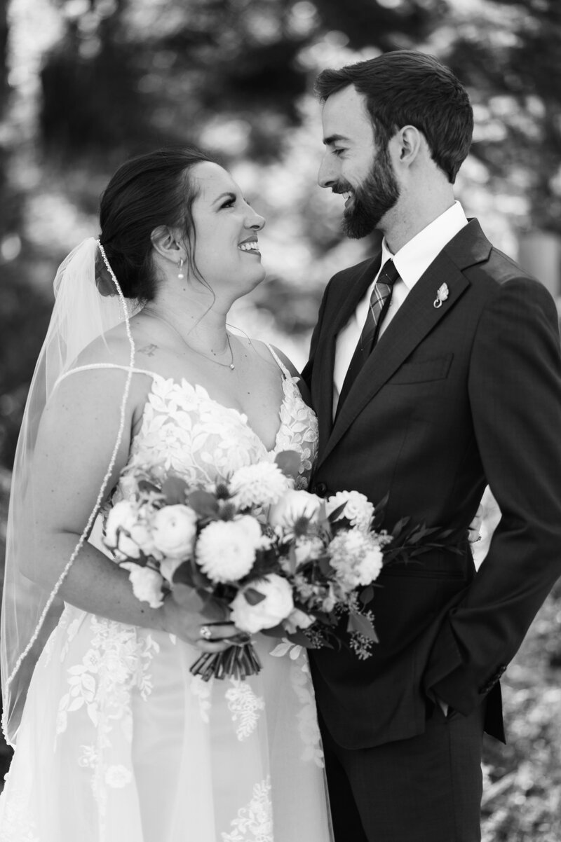 Black and white photo of Meghan and Greg dancing at their wedding in Colorado