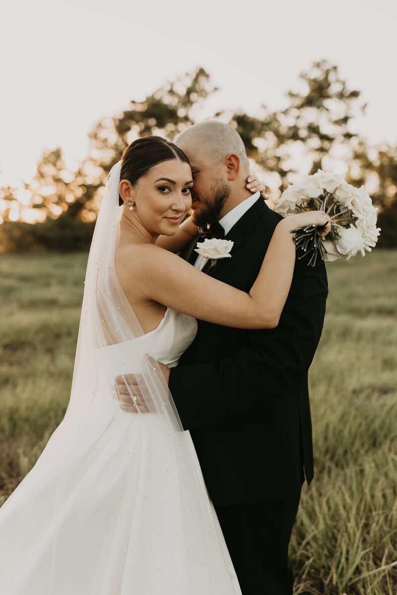 Expert bridal hair and makeup by a renowned Houston makeup artist, creating a natural, radiant look for Houston weddings and modern Houston bride-to-be styling.
