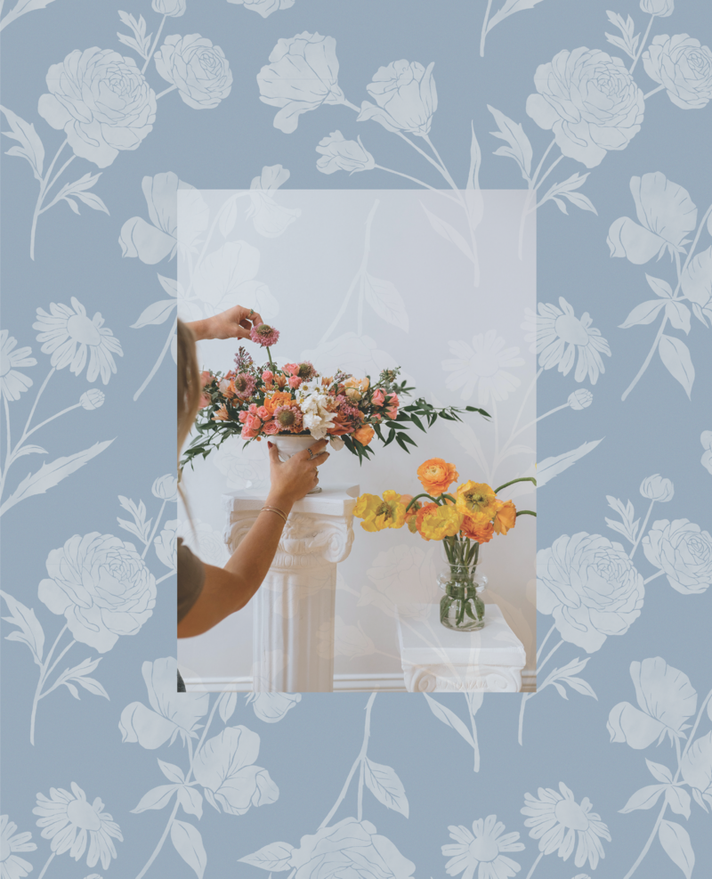 Monochromatic blue floral background pattern with an image of a florist in Saratoga Springs adjusting a floral arrangement