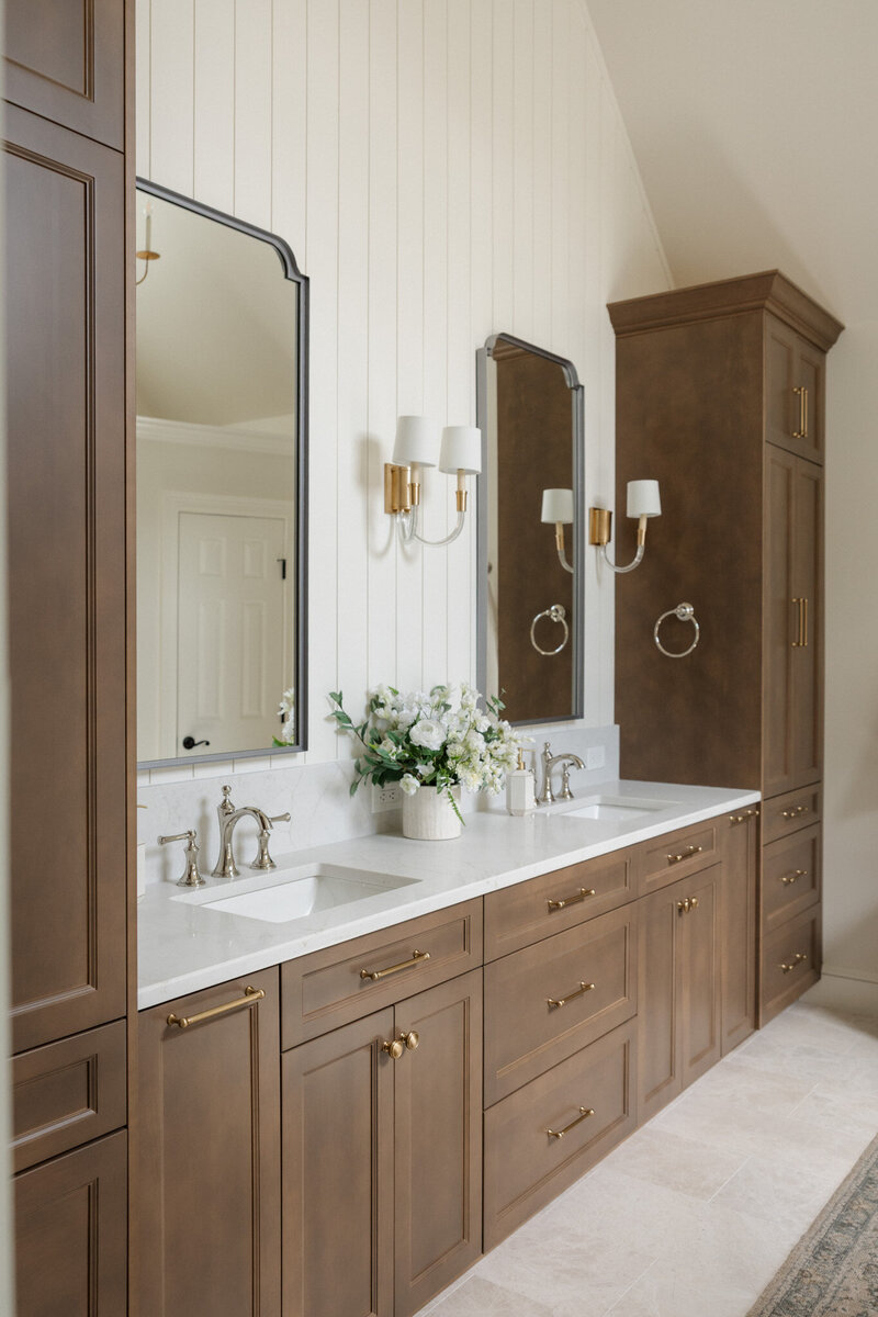 Luxury primary bathroom design in Milton, Georgia featuring a walk-in shower, freestanding tub, and elegant finishes by Megan Paterson Interiors.