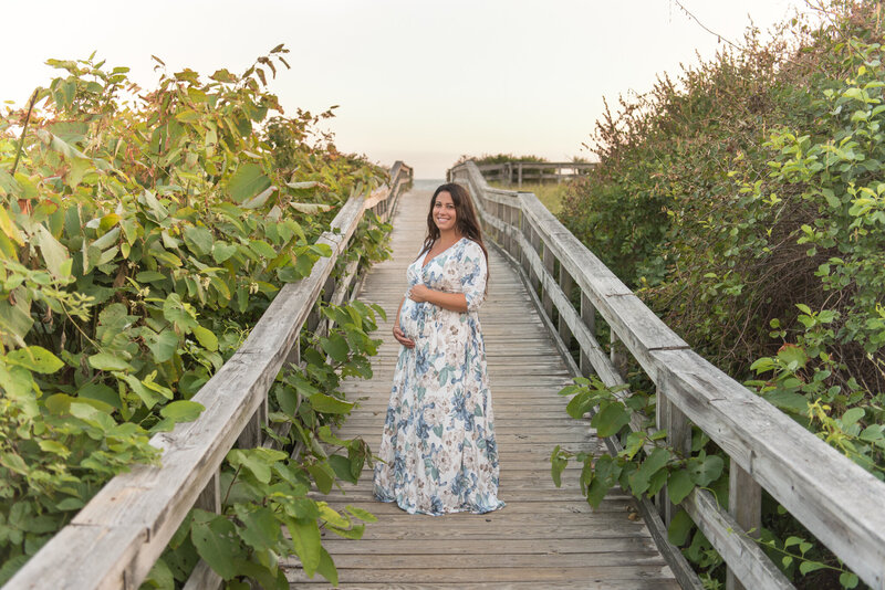 Pregnant mom at maternity session at the beach in Connecticut