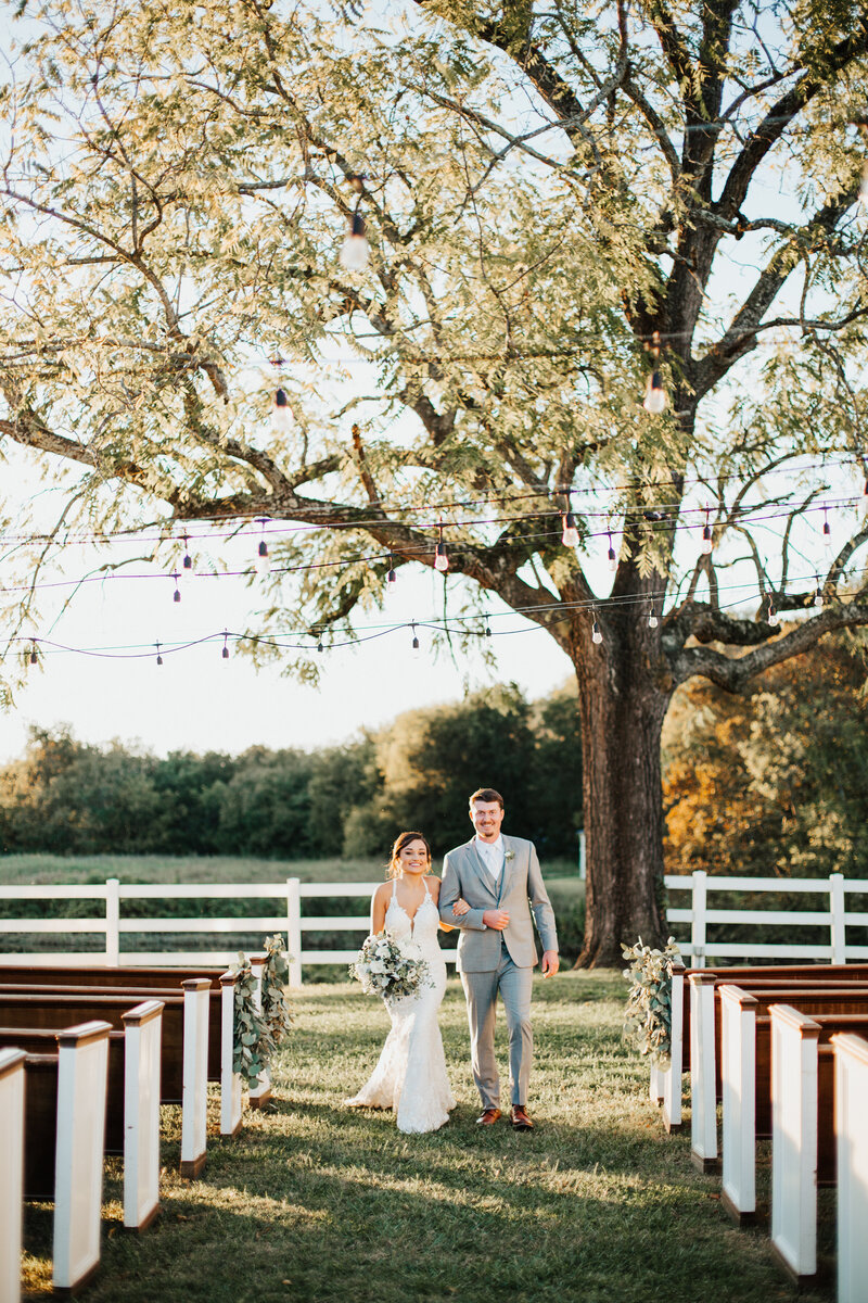 Outdoor Wedding Ceremony with Church Pews at The River Place Venue in the TN Smoky Mountains