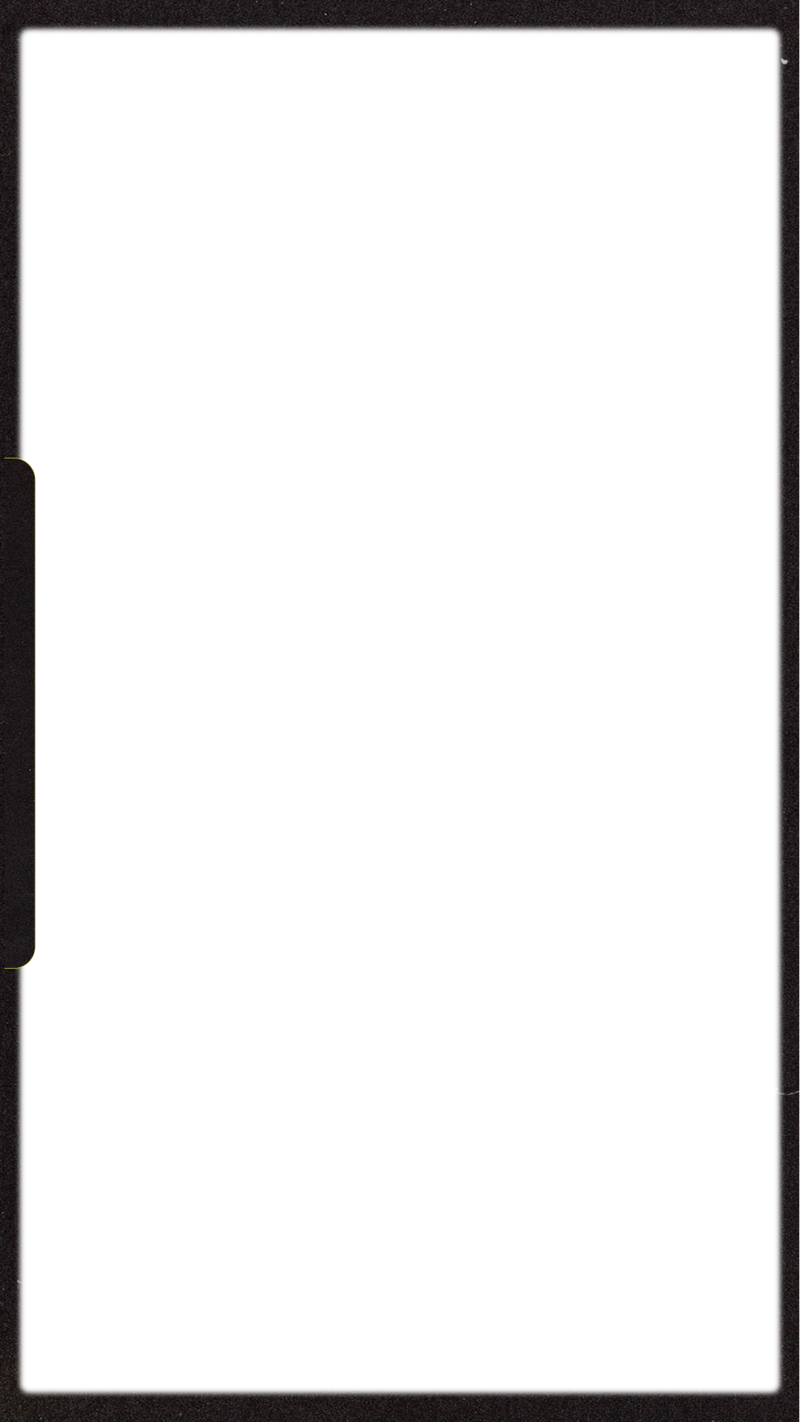 An engaged couple taking their engagement photos. They are happy and in love. 