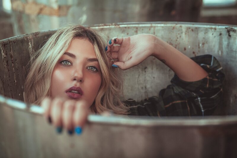 girl sitting in tub