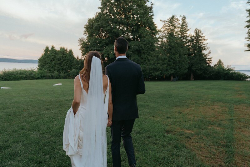 a couple walking after their vermont wedding captured by vermont wedding photographer elsie goodman
