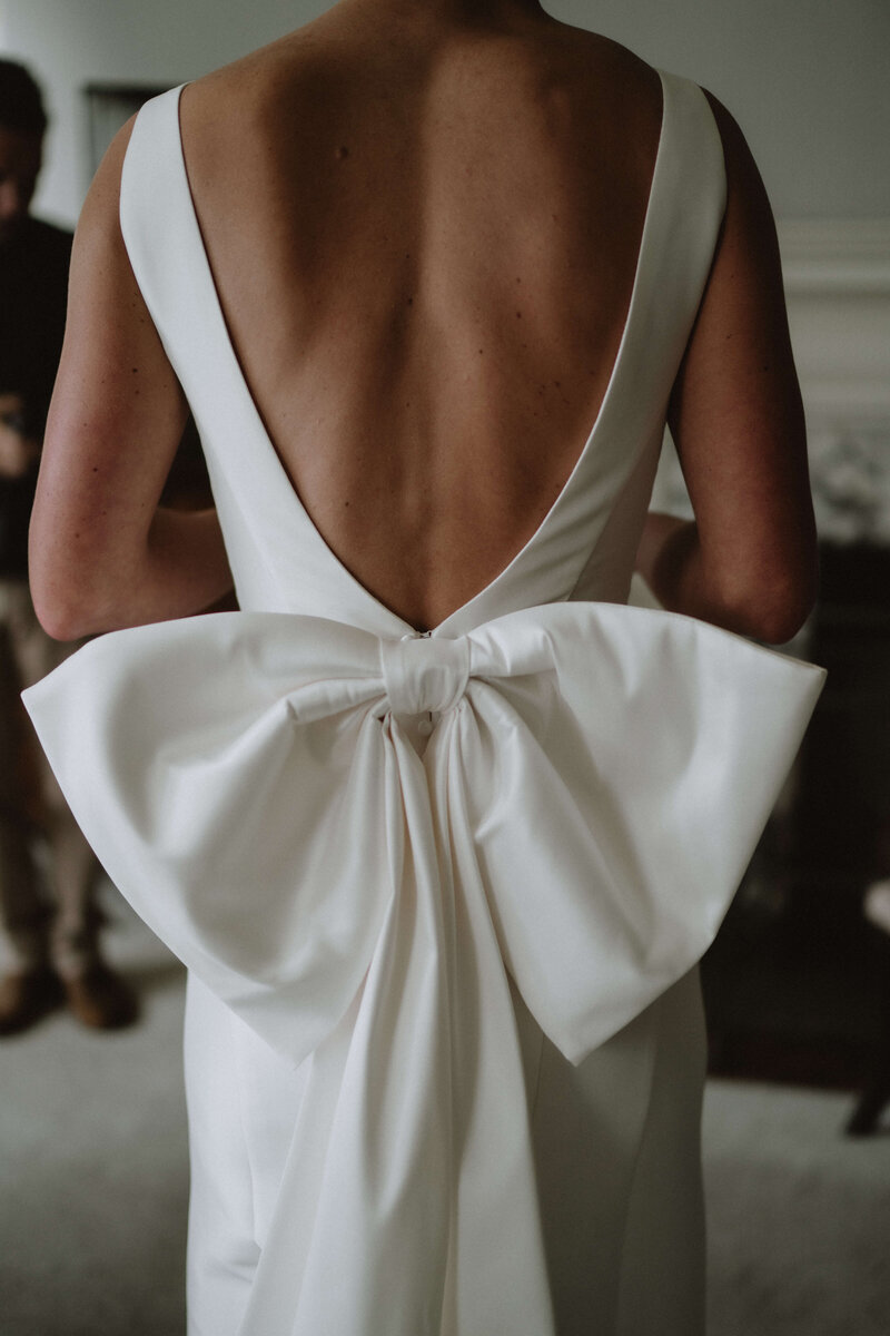 BRIDAL GOWN WITH LARGE BOW ON THE BACK