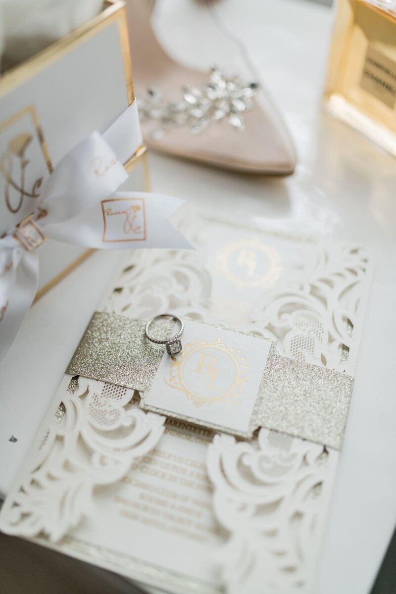 delicate and classic wedding invitation with cutout details