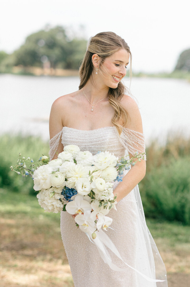 Wedding Photographers in the Bay Area, bride standing with her bouquet