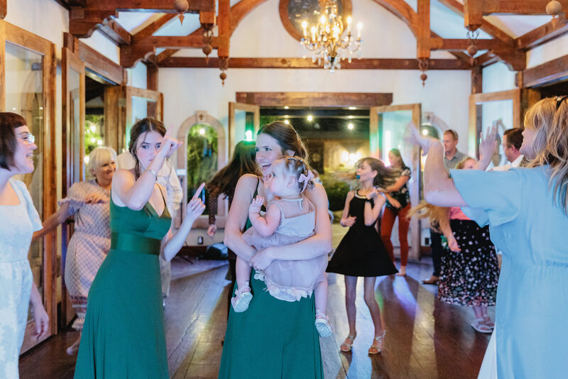 Wedding guests dance during a wedding reception