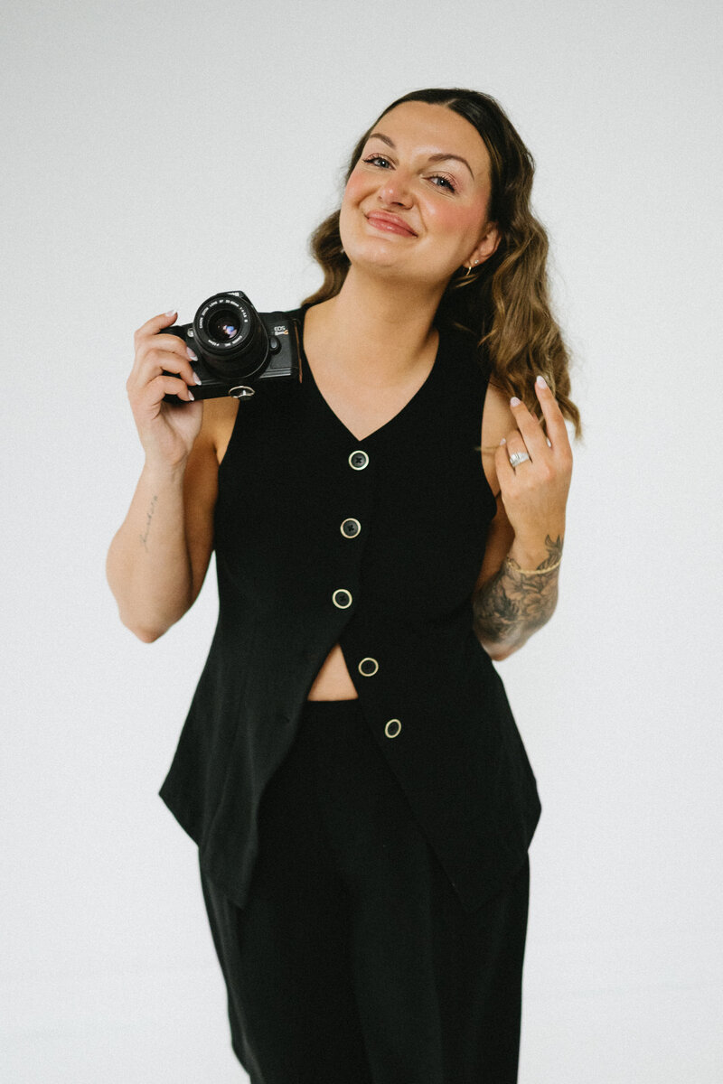 Quiet luxury and radiant joy—branding photo of a high-end wedding photographer who believes your love story is legacy-worthy.