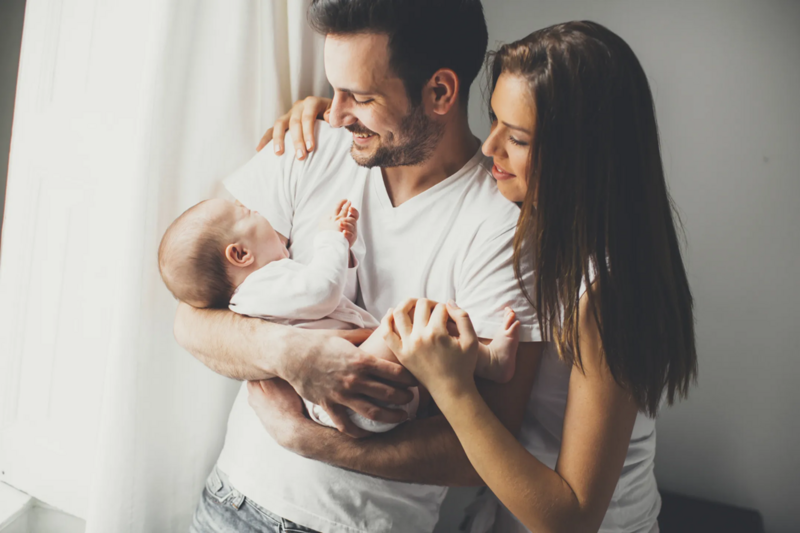 New mom holding baby