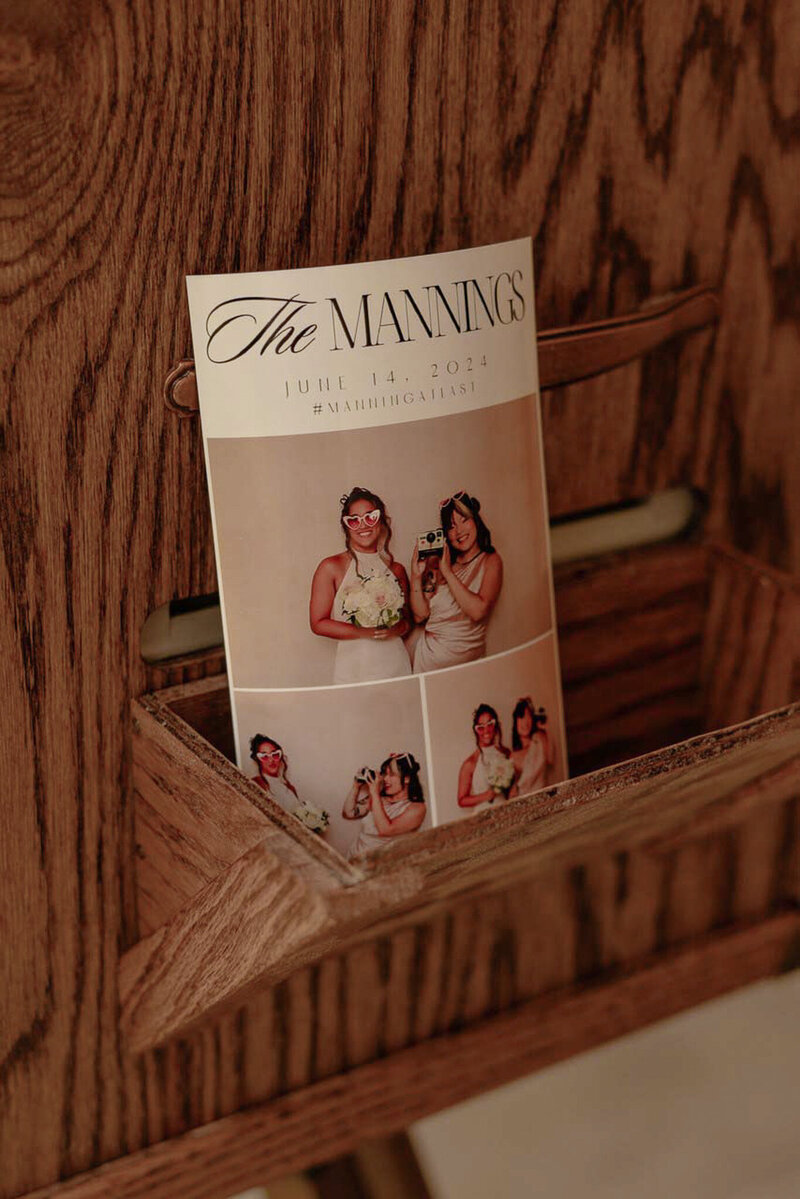 a photo booth print on a photo booth rack