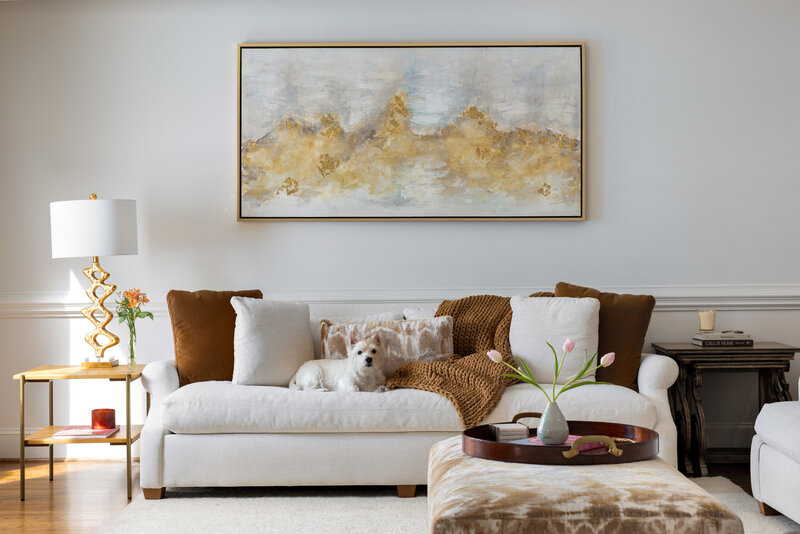 Warm and luxurious living room designed by Zimmer Interiors in Charlotte, North Carolina.