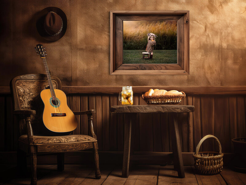 Cabin with guitar, iced tea and hat displaying a beautiful photo on the wall.