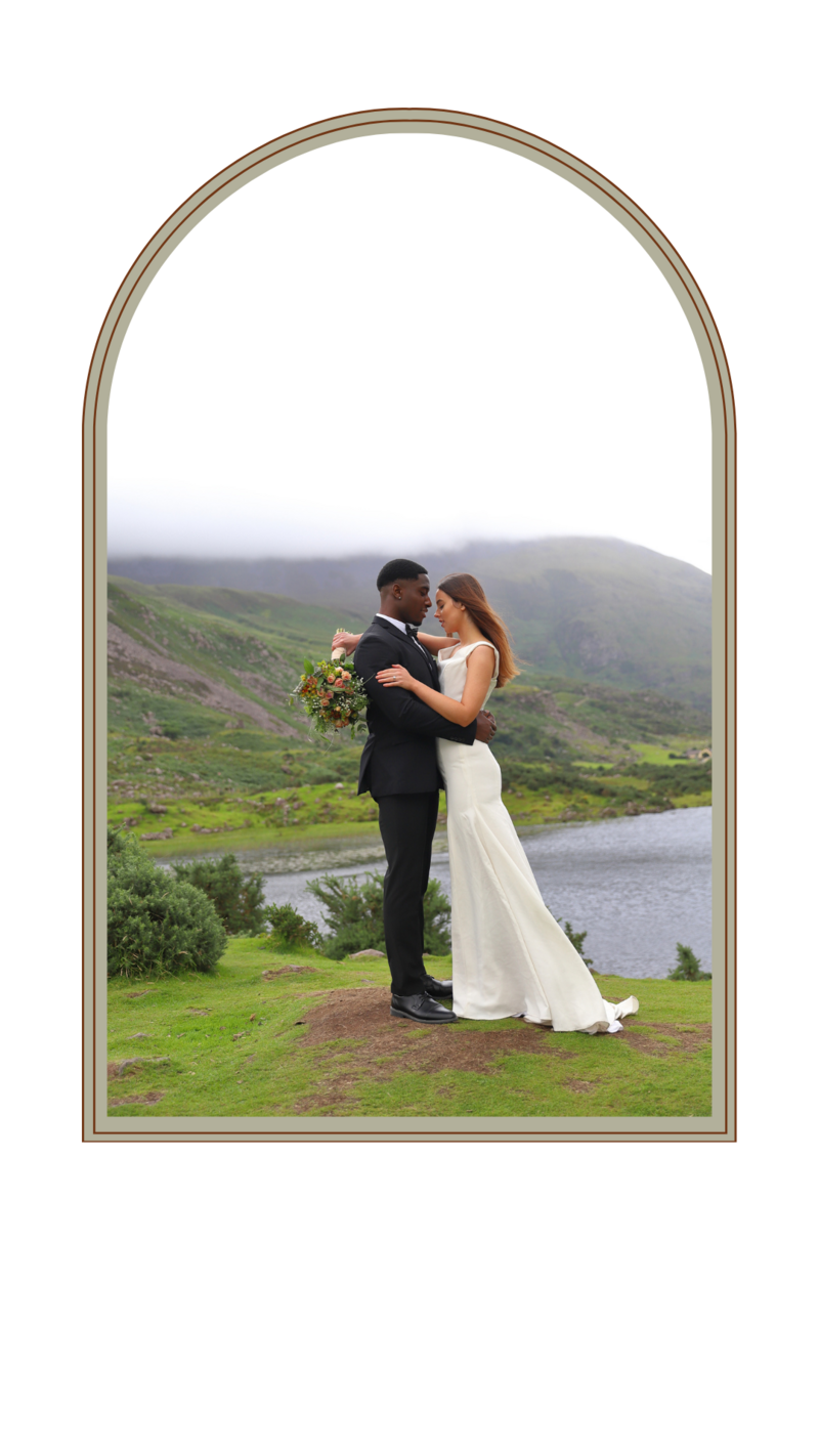 Interracial bride and groom posing for photos during their elopement in  Ireland