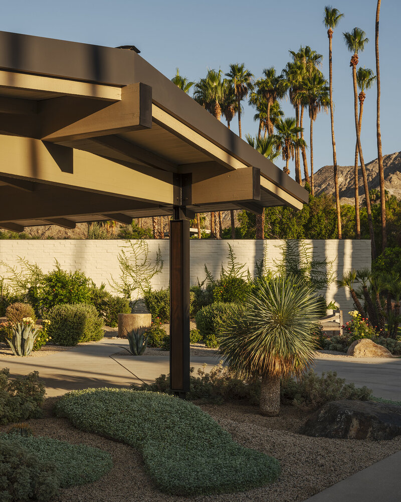 Boardformed concrete window on front entry designed by Palm Springs architect