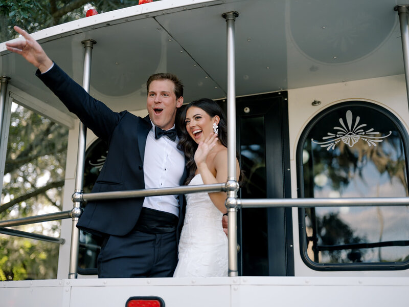 bride and groom on trolly in Biloxi MS