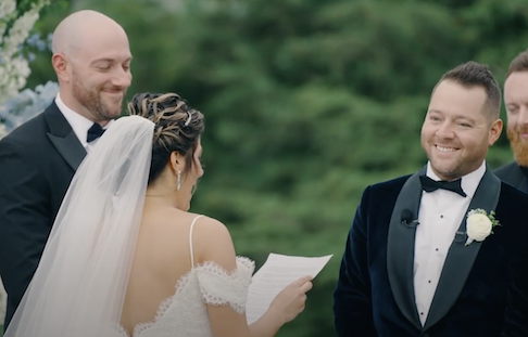 Woman reading custom wedding vows written by Vows & Speeches