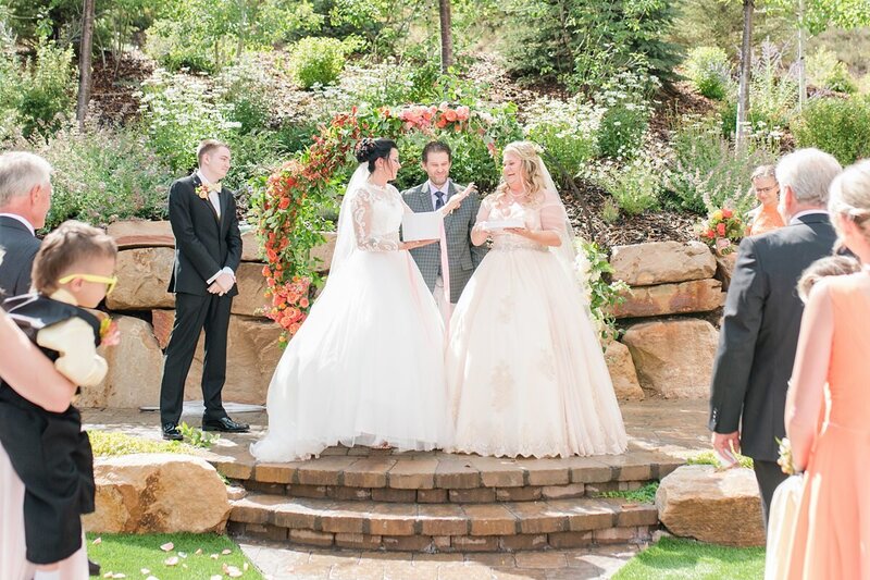 Brides getting married and releasing butterflies at Hyatt Centric Park City