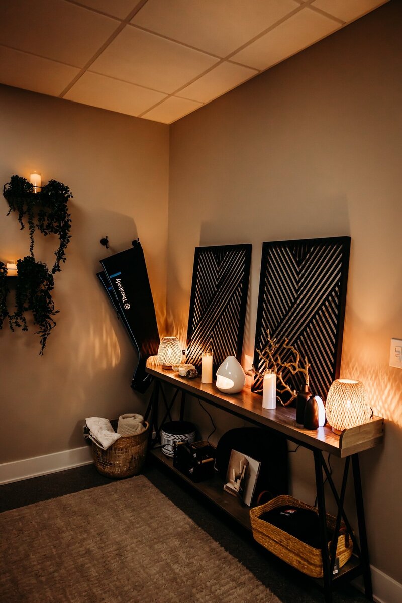 Relaxing therapy room lit up with small lamps