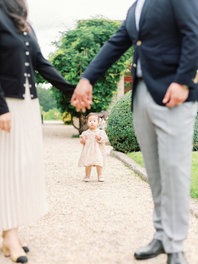 The girl looking at her parents
